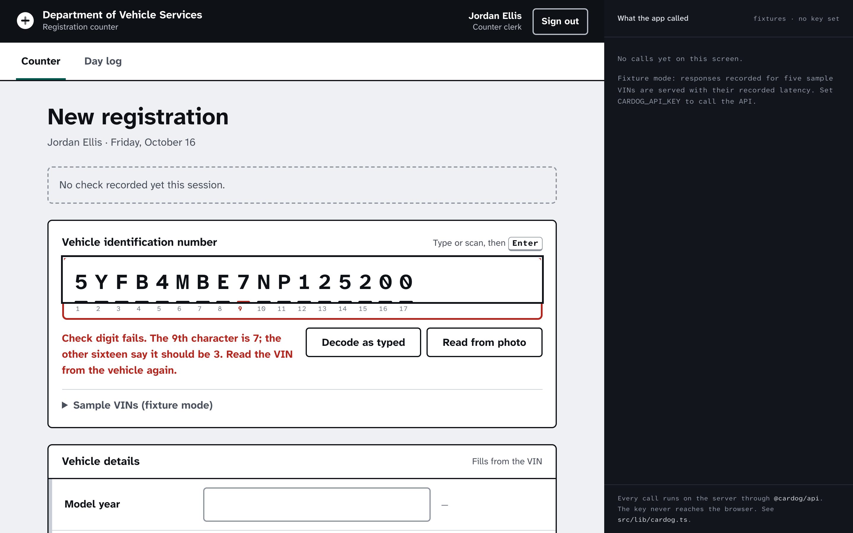 The counter's VIN strip with a VIN one character off and its check digit failing